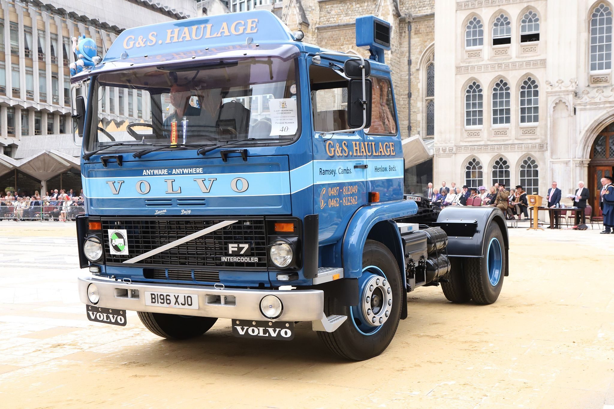 Volvo F7 1985 B196XJO. City of London 2023 Cart Marking in Guildhall Yard on 22-Jul-2023. Hosted by the Worshipful Company of Carmen with the Lord Mayor of the City of London in attendance. Wooden plates on the vehicles are branded with hot irons to allow them to ply for trade in the Square Mile. Another of the City Livery Company's annual ceremonies.