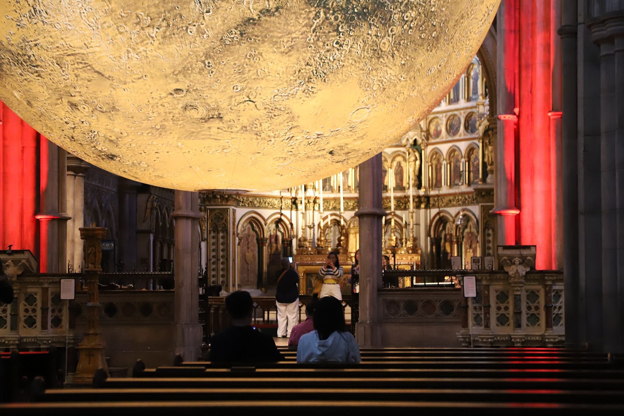 Luke Jerram's "Mars: War & Peace" hosted by the Kensington and Chelsea Festival at St John the Baptist Church in Holland Road, West London.