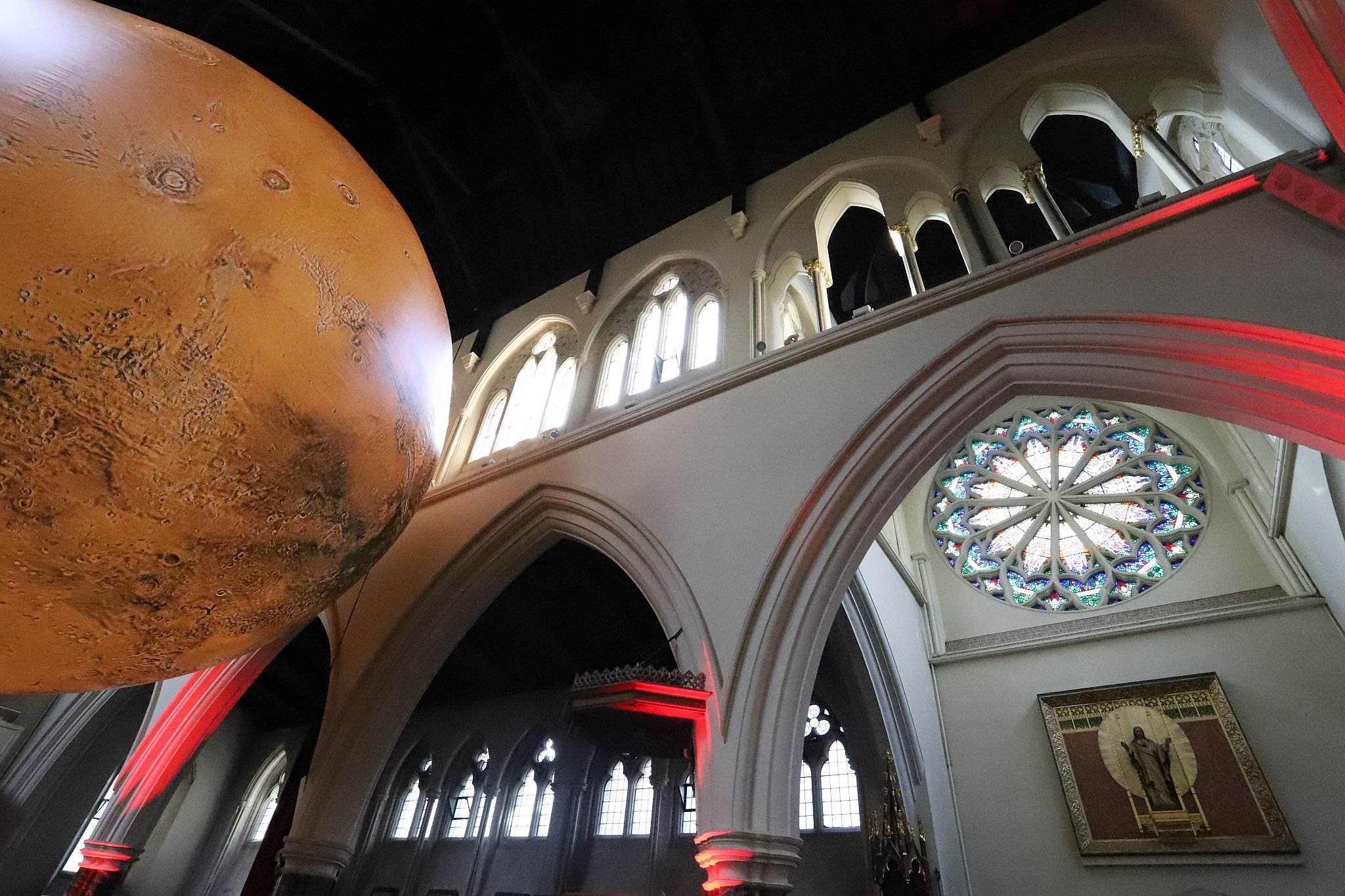 Luke Jerram's “Mars: War and Peace" at All Saints’ Church, Notting Hill, London on 01-Aug-2023. Presented by the Kensington and Chelsea Festival. https://bryan-jones.com