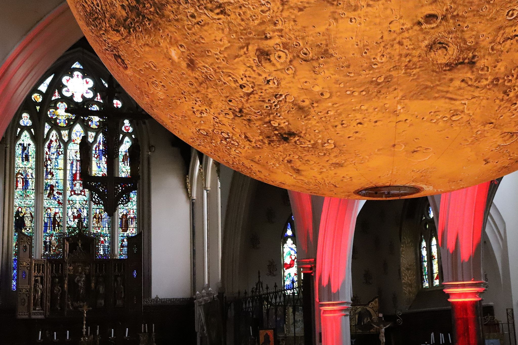 Luke Jerram's “Mars: War and Peace" at All Saints’ Church, Notting Hill, London on 01-Aug-2023. Presented by the Kensington and Chelsea Festival. https://bryan-jones.com