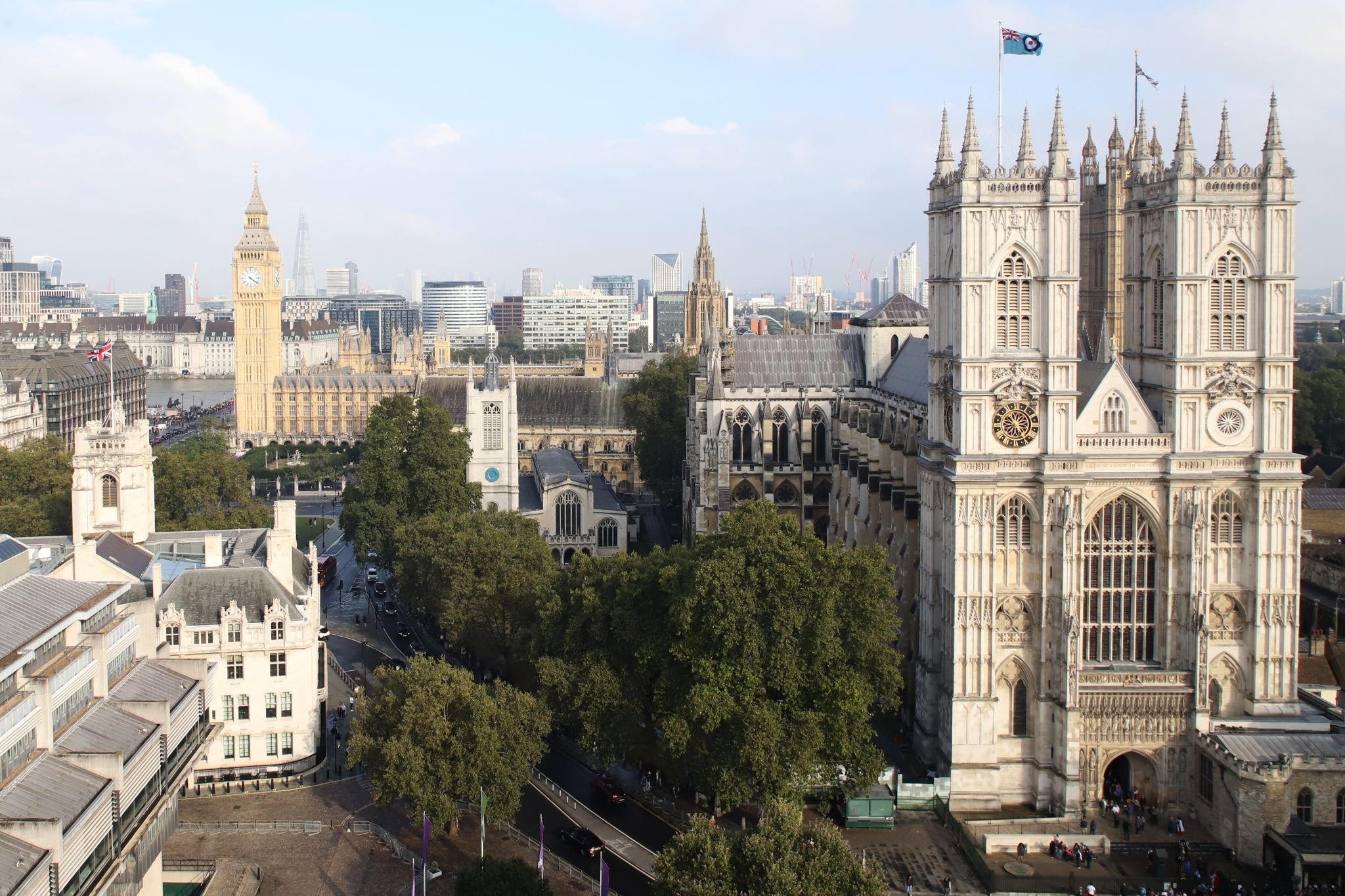 Westminster Abbey, St Margret's Church and the Houses of Parliament. Royal Air Force ensign (flag) flying from Westminster Abbey for Battle of Britain Sunday. View from the balcony of the dome on Methodist Central Hall. 17-Sep-2023.