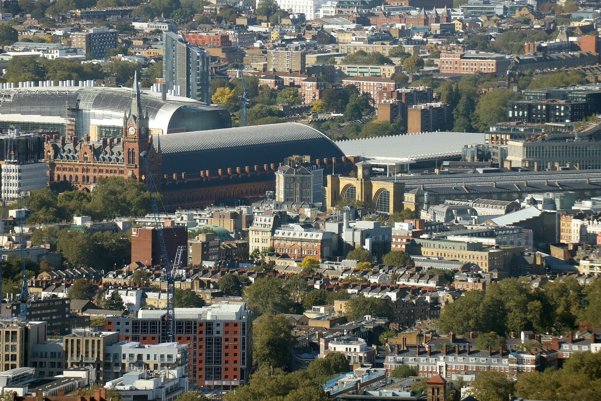 Aerial view of Kings Cross and St. Pancras railway stations in Camden. View from the Horizon observation platform on the 58th floor of 22 Bishopsgate in the City of London. Photo taken on 15-Oct-2023.
