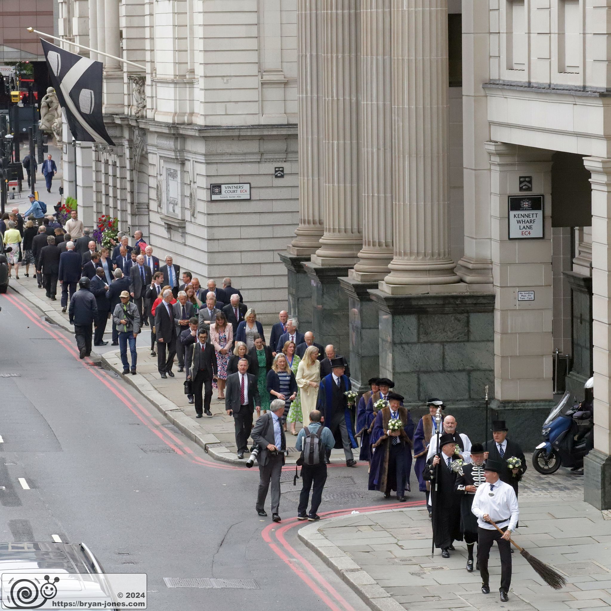 2024 annual Vintners' company procession to St James Garlickhythe church following the installation of the new Master. Led by a sweeper. 10-Jul-2024.