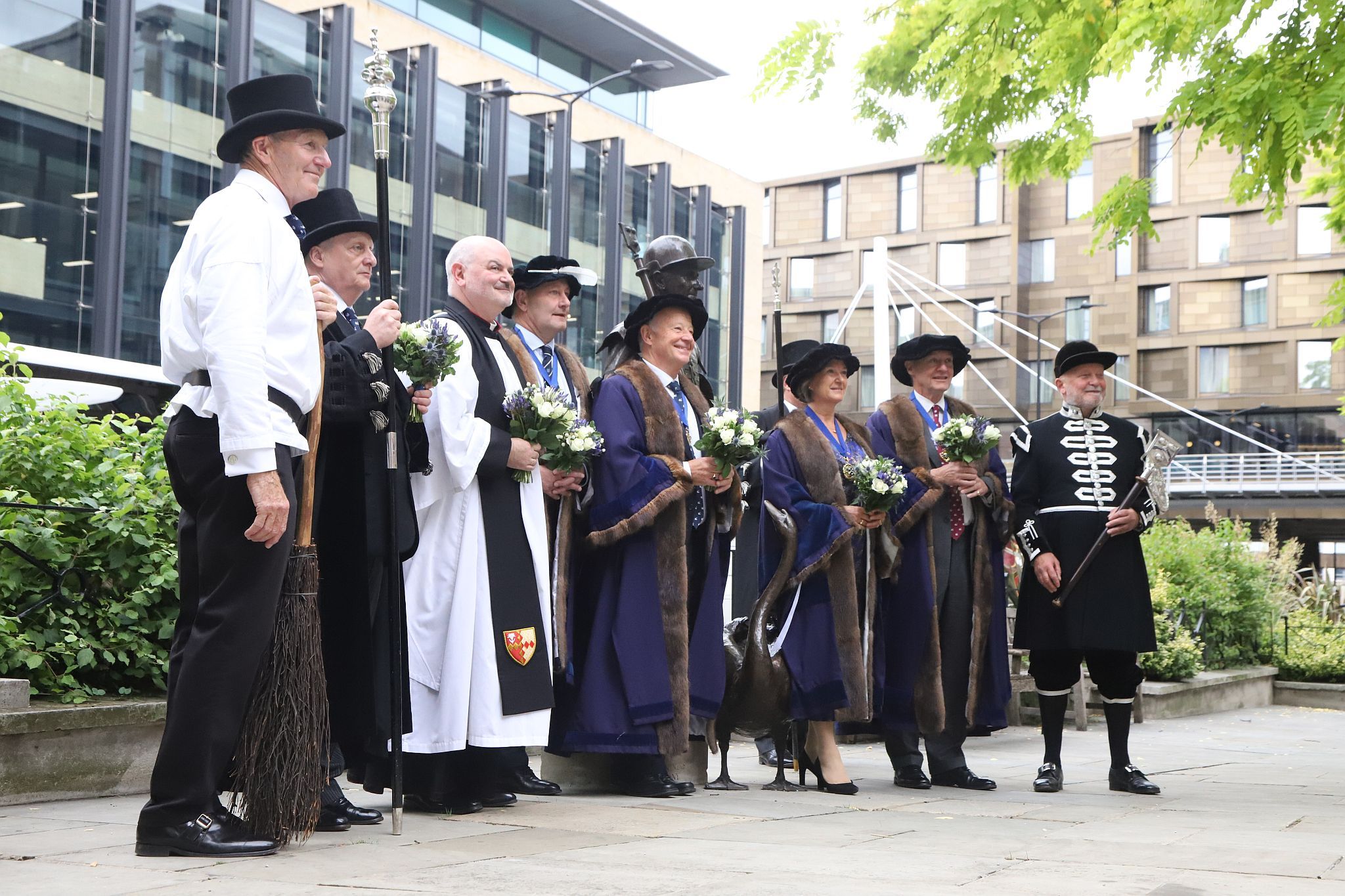 2024 annual Vintners' company procession to St James Garlickhythe church following the installation of the new Master. Led by a sweeper. 10-Jul-2024.