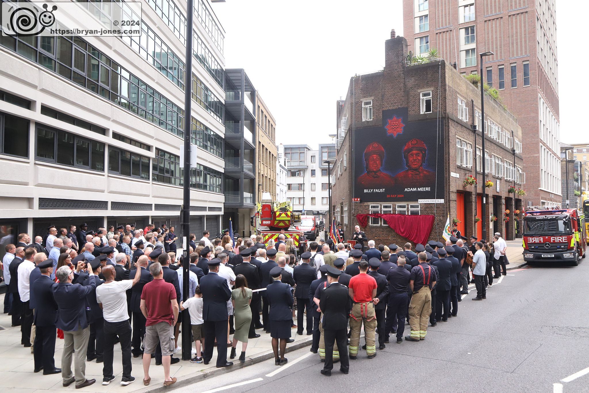 London Fire Brigade 20th anniversary memorial service for Billy Faust and Adam Meere. Unveiling of mural at Whitechapel fire station painted by artist David Speed. 20-Jul-2024.