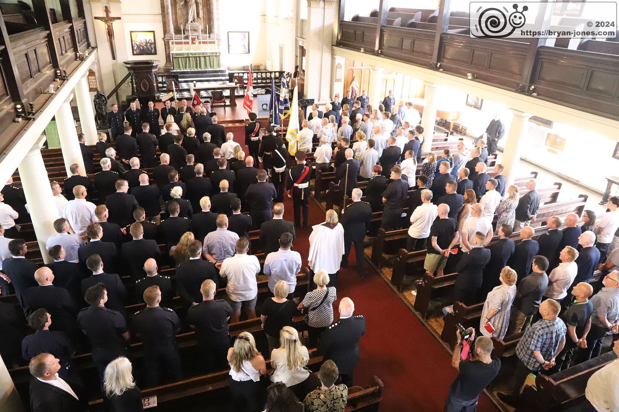 London Fire Brigade 20th anniversary memorial service for Billy Faust and Adam Meere in the Bethnal Green fire. Church memorial service at St John on Bethnal Green. 20-Jul-2024.