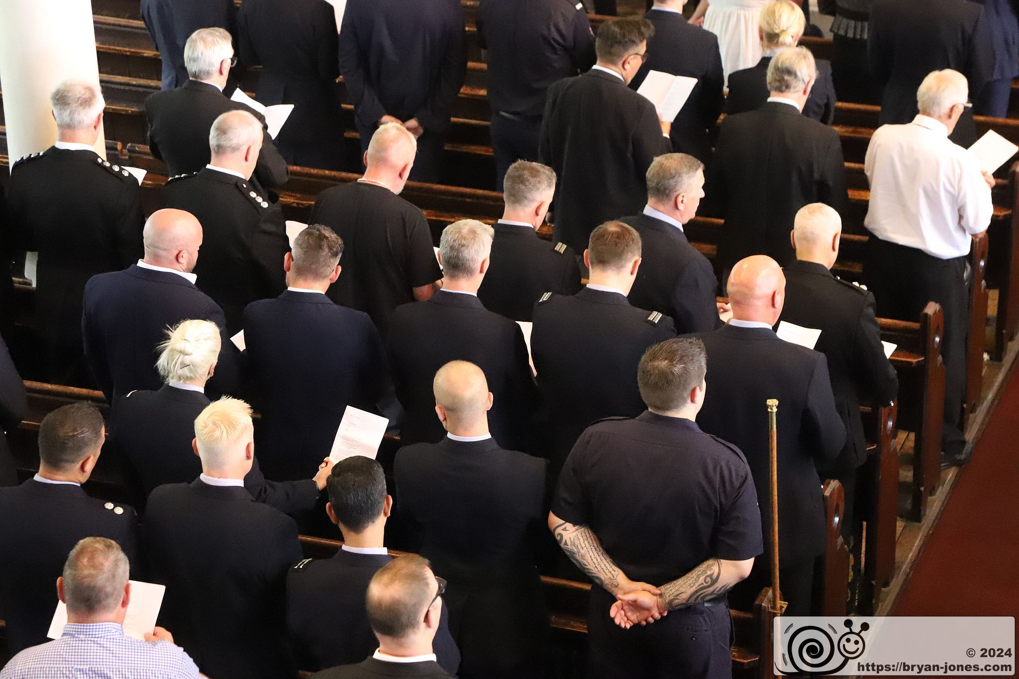 London Fire Brigade 20th anniversary memorial service for Billy Faust and Adam Meere in the Bethnal Green fire. Church memorial service at St John on Bethnal Green. 20-Jul-2024.