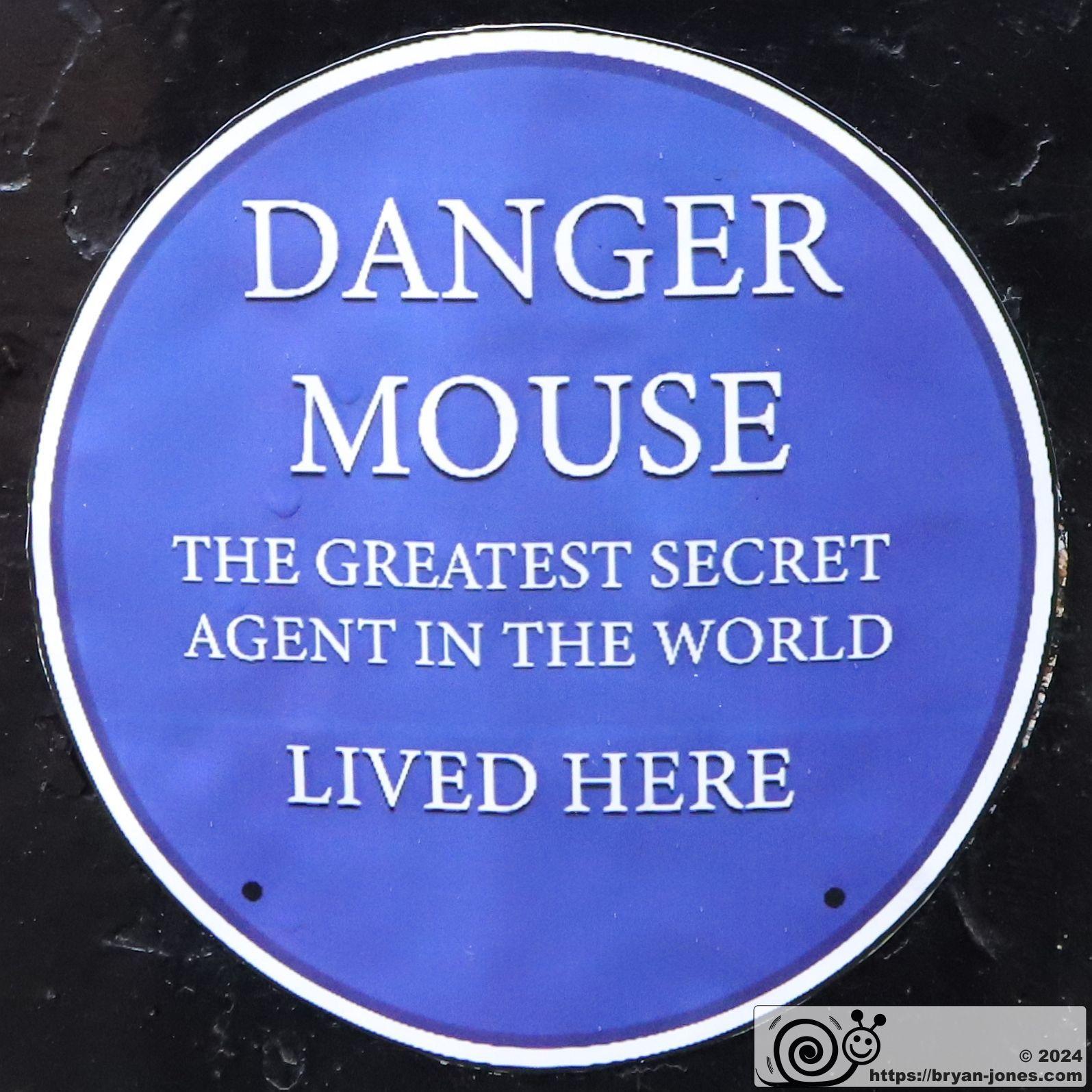 Danger Mouse blue plaque at the junction of Baker Street and Melcombe Street. The smallest blue plaque in London is on a postbox in which the children's cartoon secret agent lived.