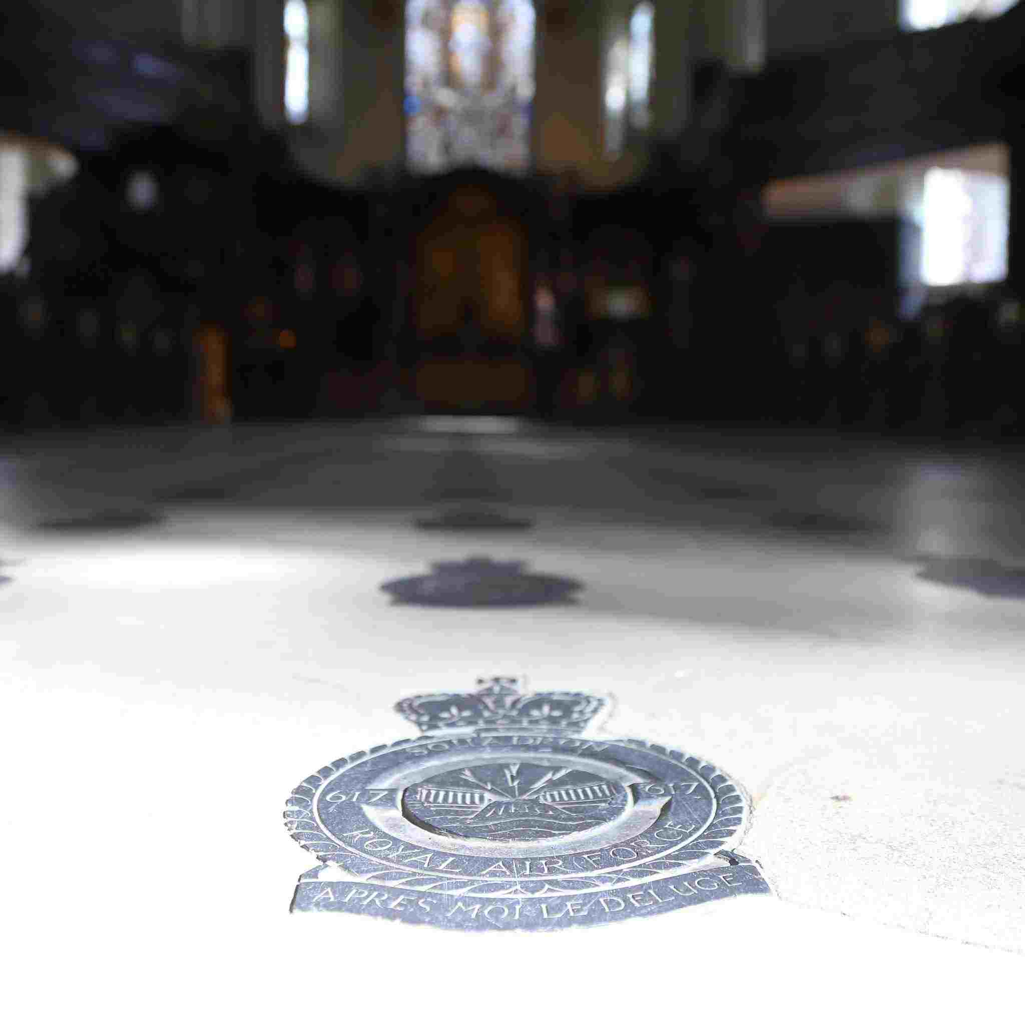 617 squadron badge - The Dambusters - set into the floor of St Clement Danes church in The Strand, London. Central Church of the RAF. 23-Sep-2023.