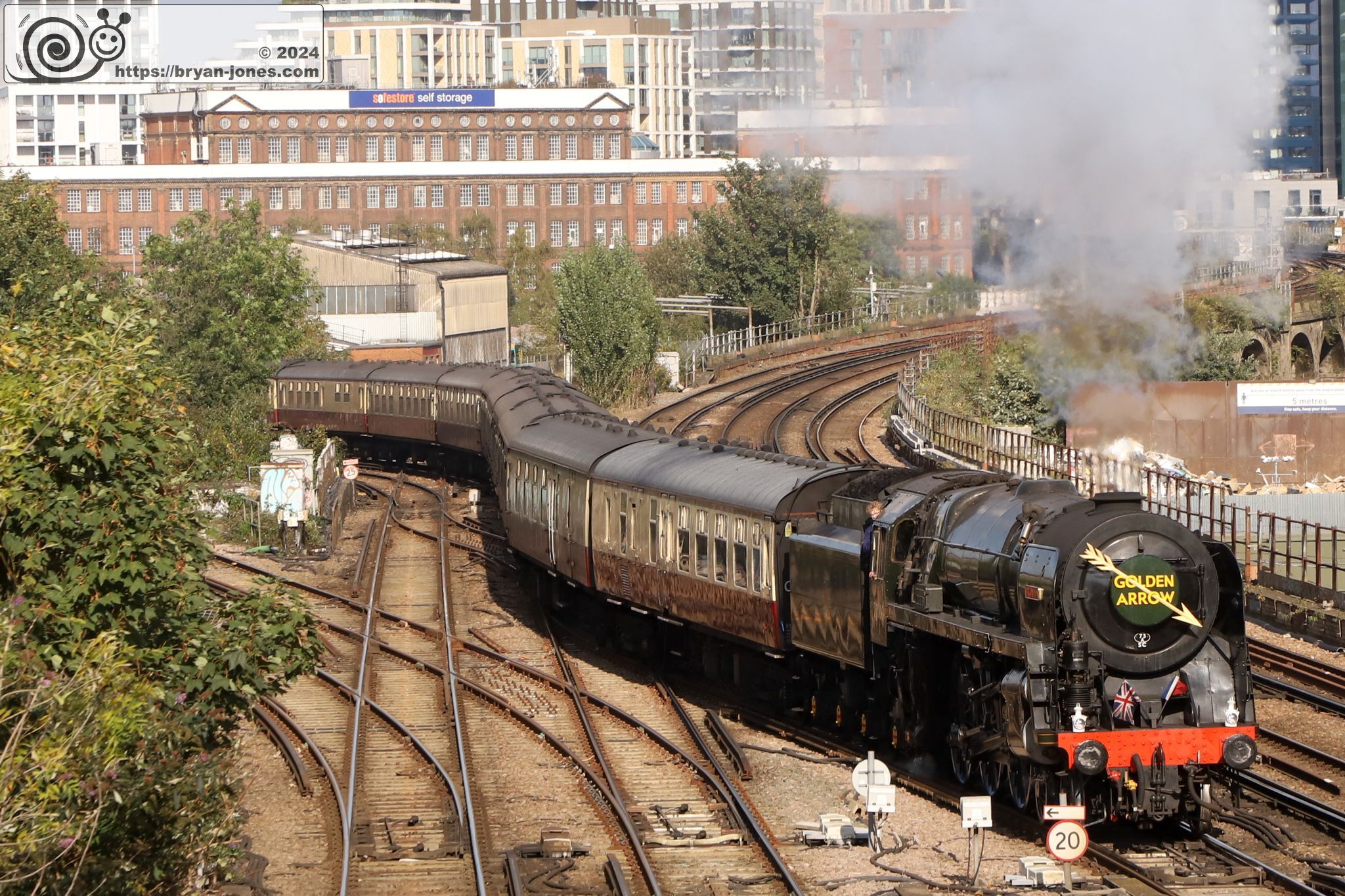 BR steam engine 70000 Britannia approaching Wandsworth Road station. 05-Oct-2024.