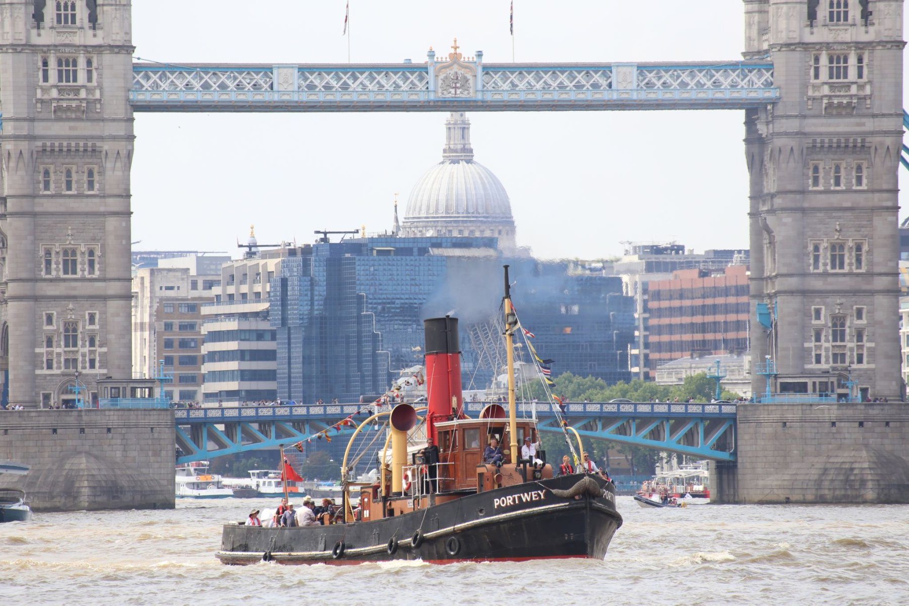 Steam Tug Portwey passes in front of Tower Bridge on the River Thames, 14-Jul-2018