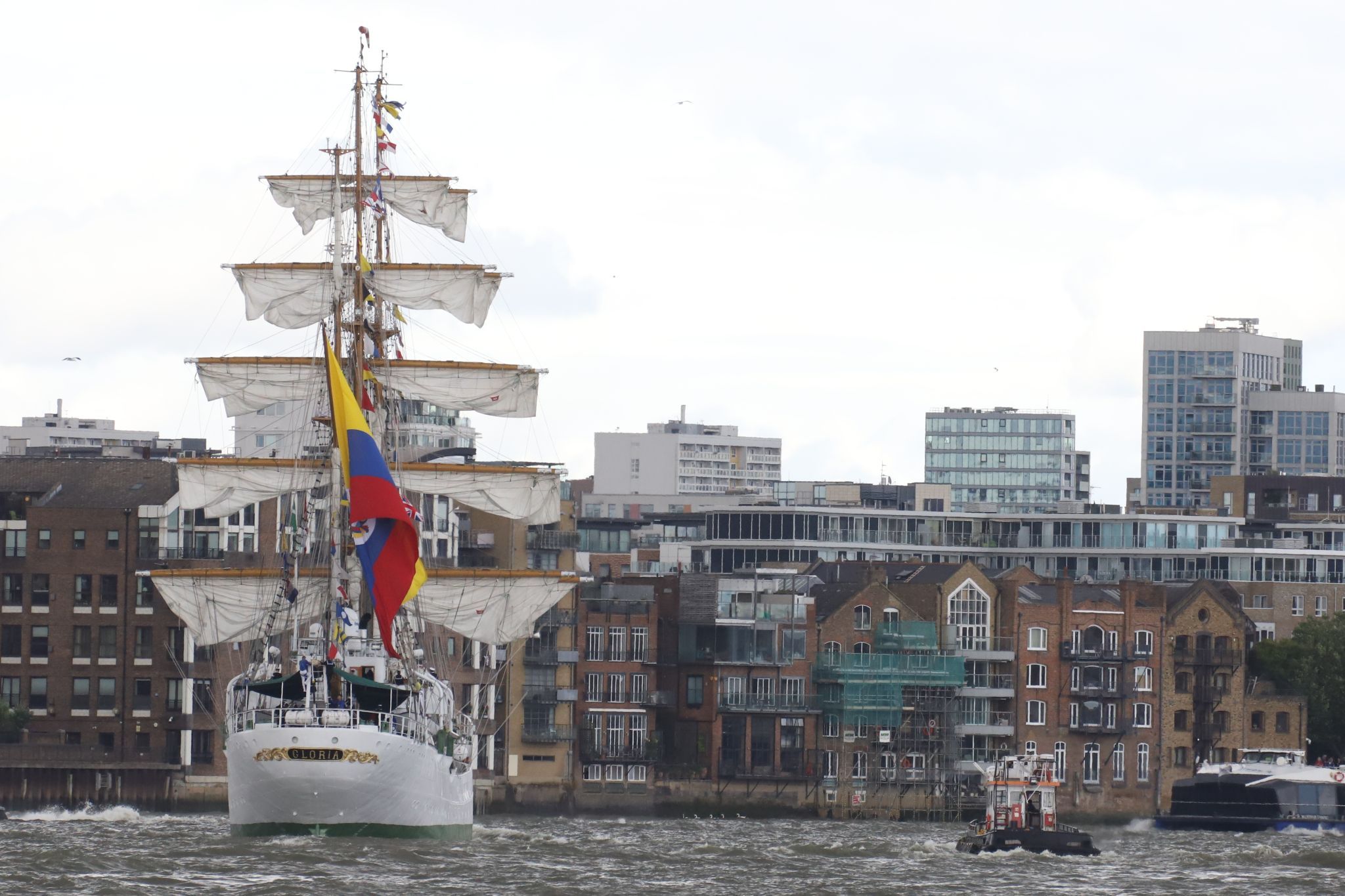 Tall ship ARC Gloria, flagship of the Colombian Navy, sails through Wapping Reach on the River Thames in London. 06-Jul-2024.