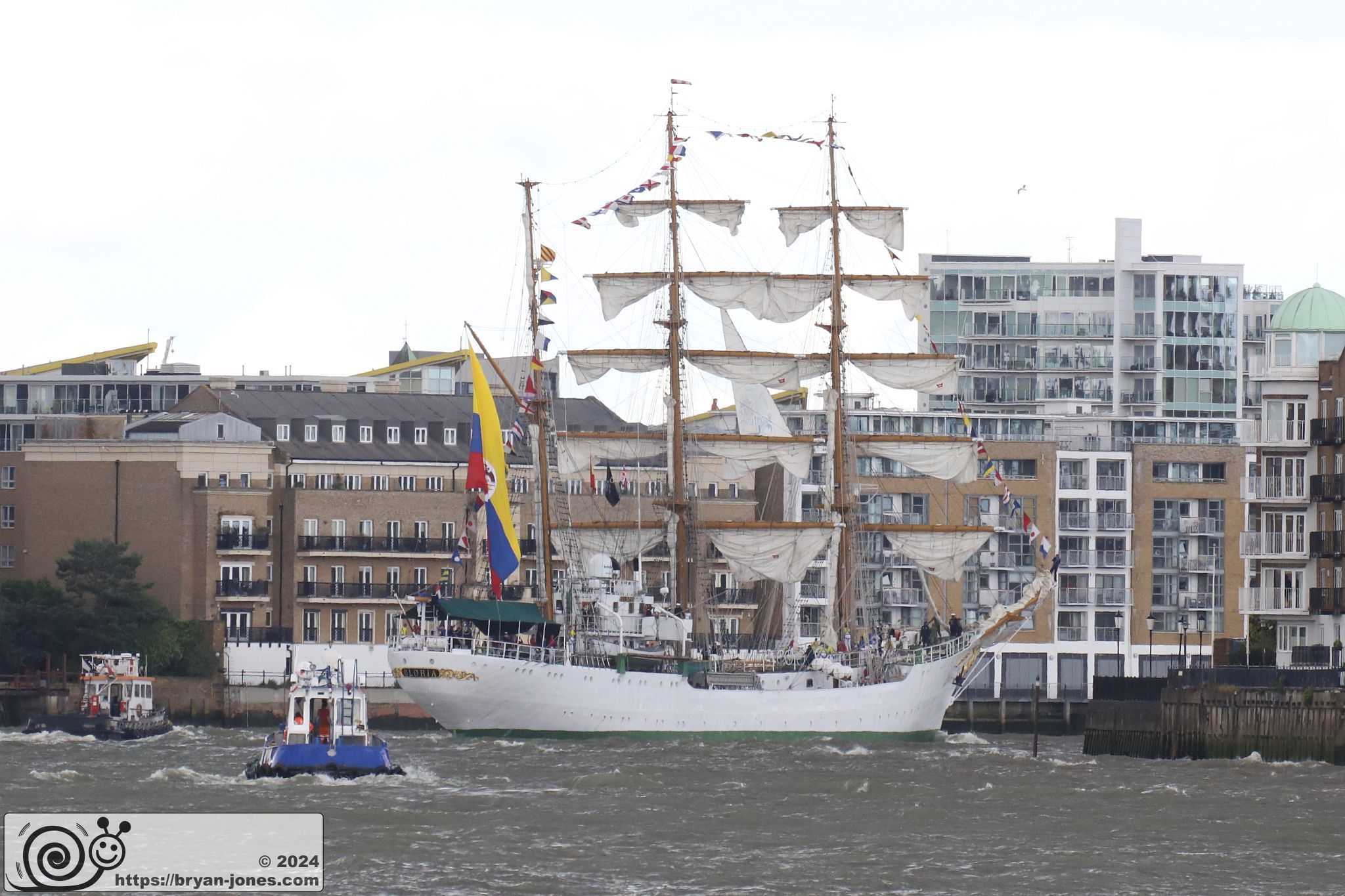 Tall ship ARC Gloria, flagship of the Colombian Navy, sails through Wapping Reach on the River Thames in London. 06-Jul-2024.