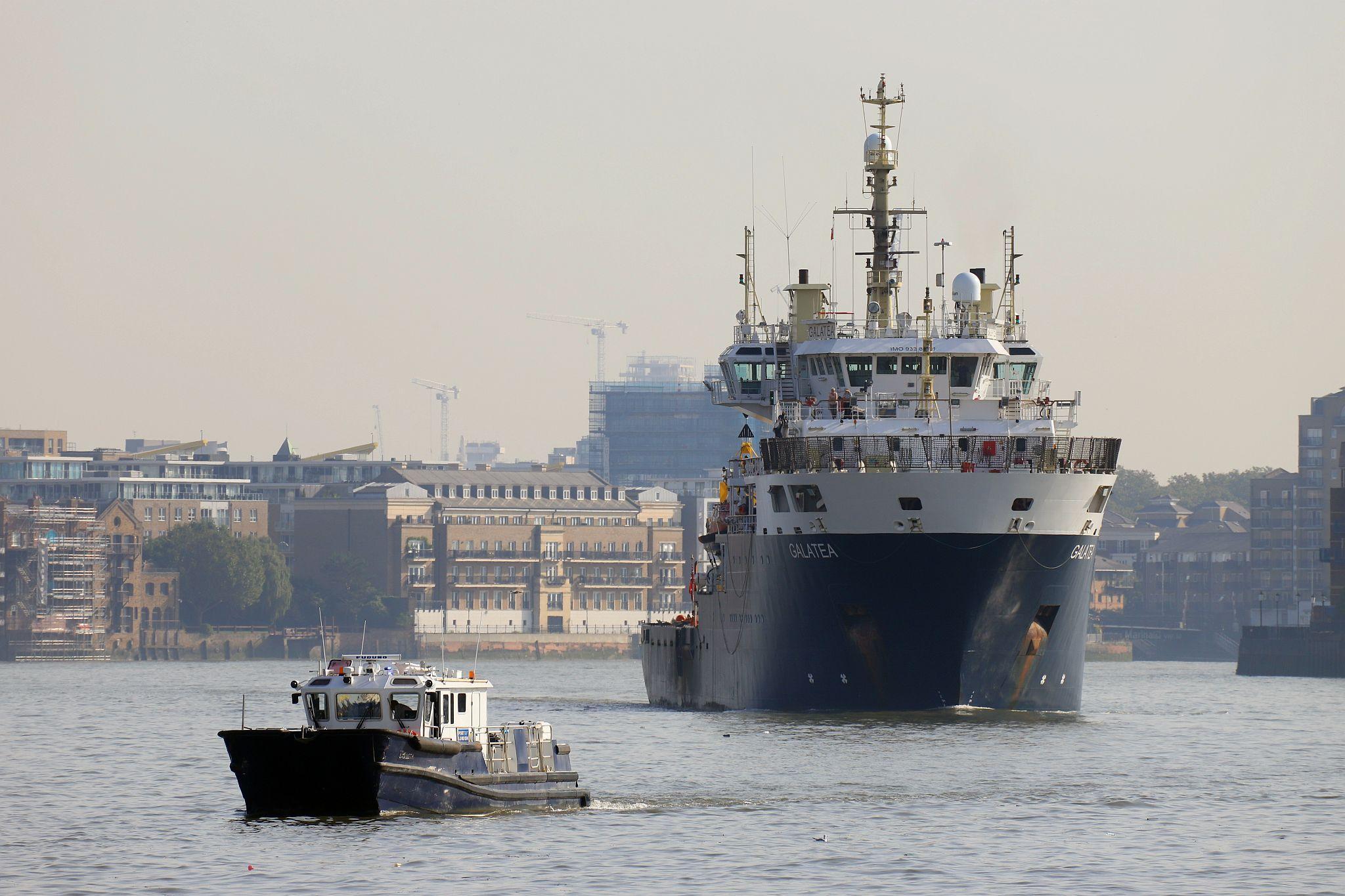 Trinity House Vessel Galatea, escorted by the Port of London Authority launch "Lambeth", sailing up the River Thames past Wapping and Rotherhithe towards the Pool of London. 09-Sep-2023.