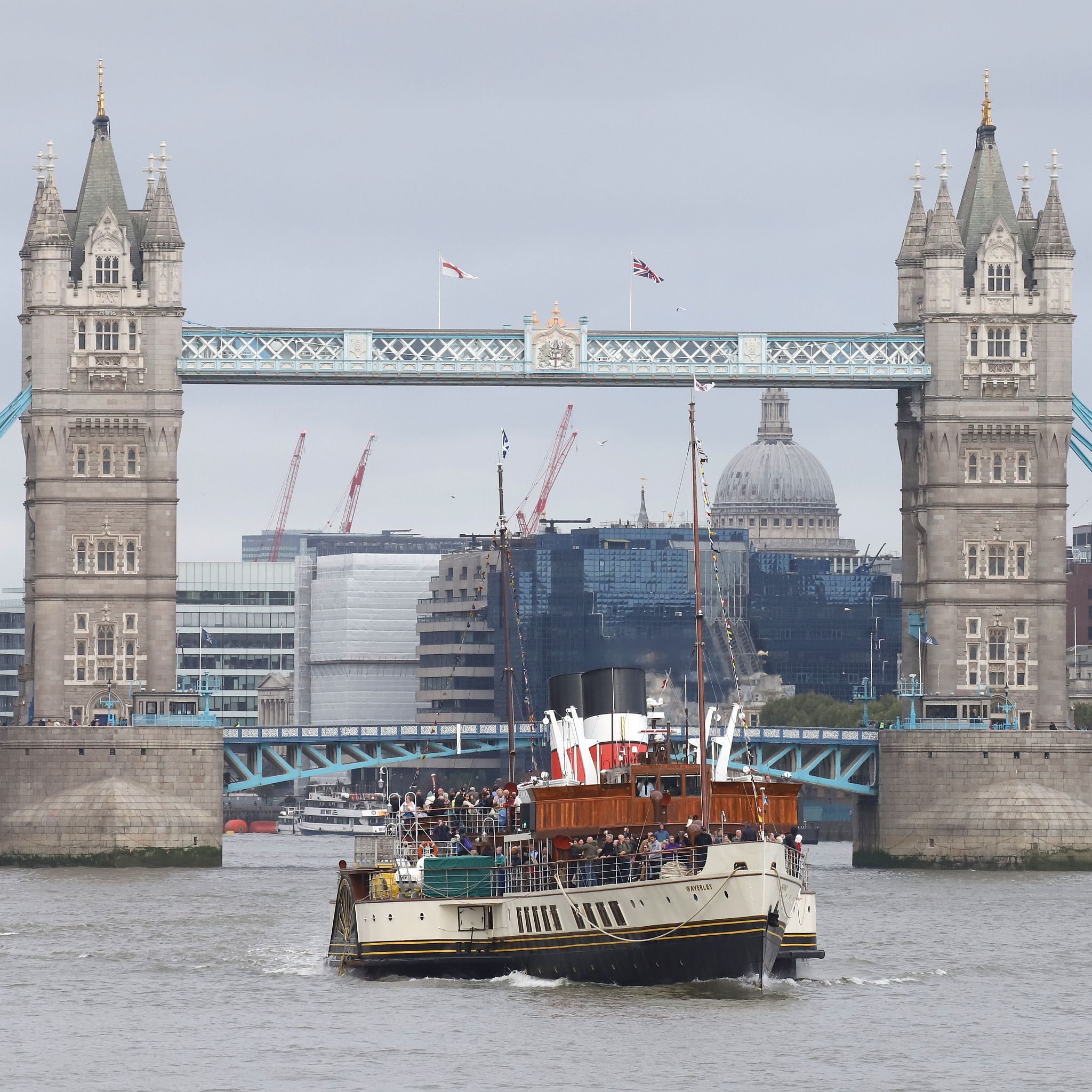 Paddle Steamer Waverley sails down the River Thames towards the sea. 24-Sep-2023. Tower Bridge in the background.