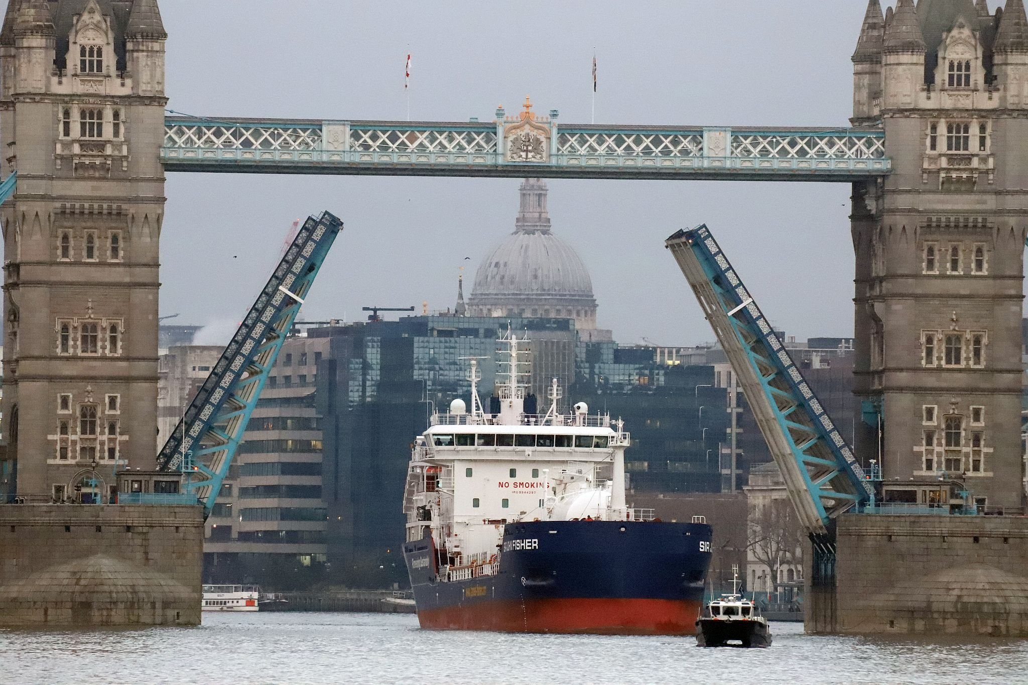 Chemical Tanker “Sir John Fisher”, owned by James Fisher, leaves central London on 29-Mar-2023 and passes downstream on the River Thames through Tower Bridge.