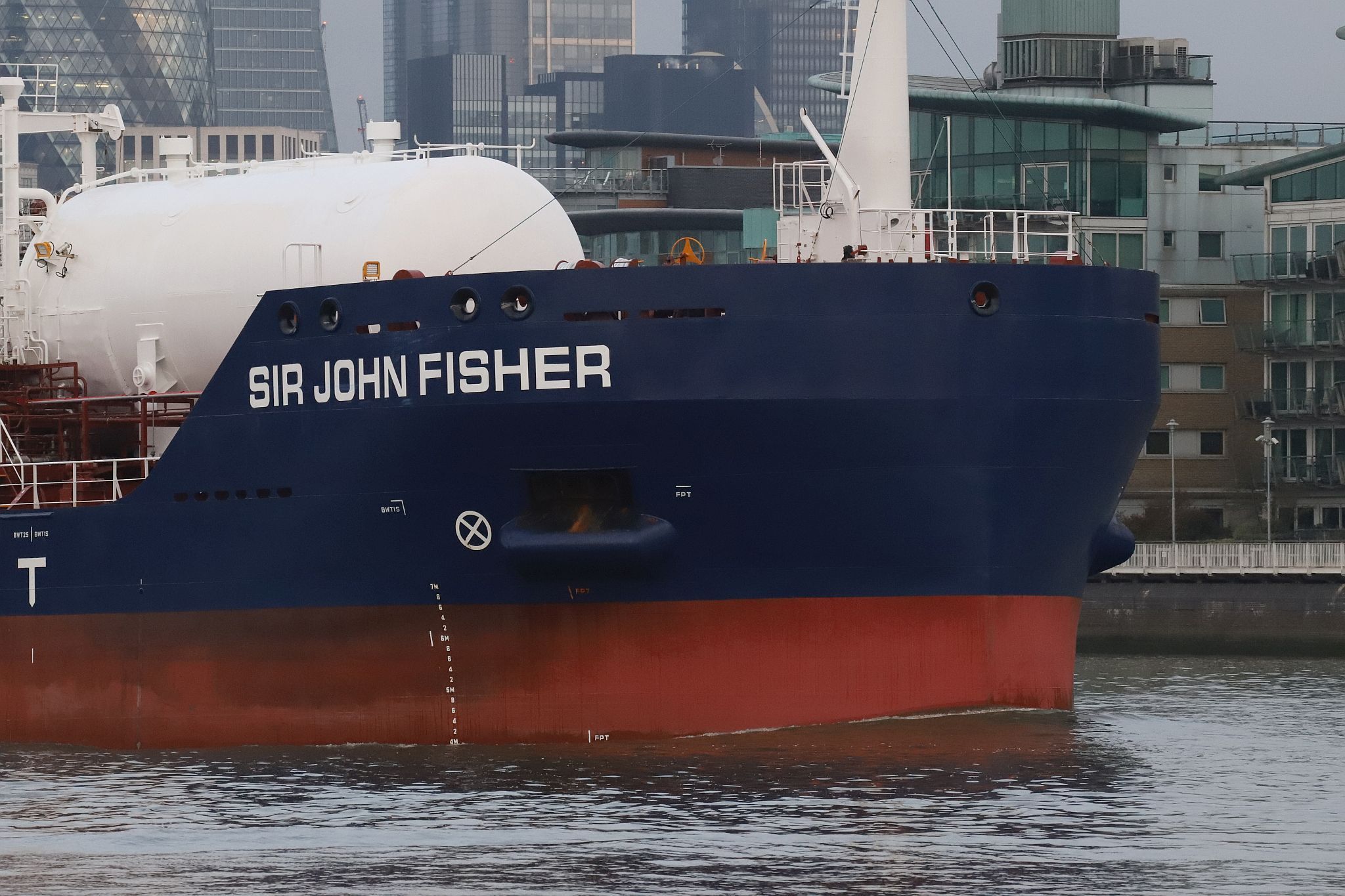 Chemical Tanker “Sir John Fisher”, owned by James Fisher, leaves central London on 29-Mar-2023 and passes downstream on the River Thames.