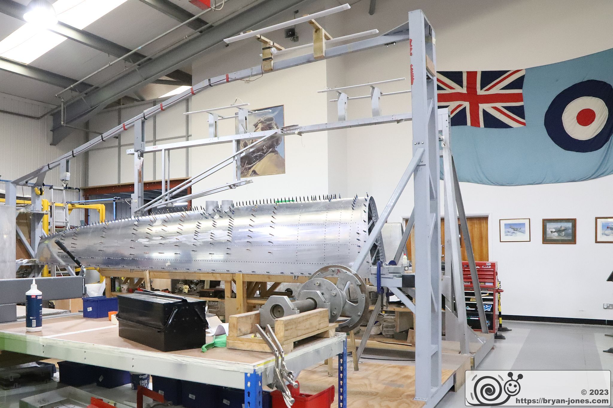 Polished metal Spitfire wing from Spitfire Mk IX MA764 in a jig