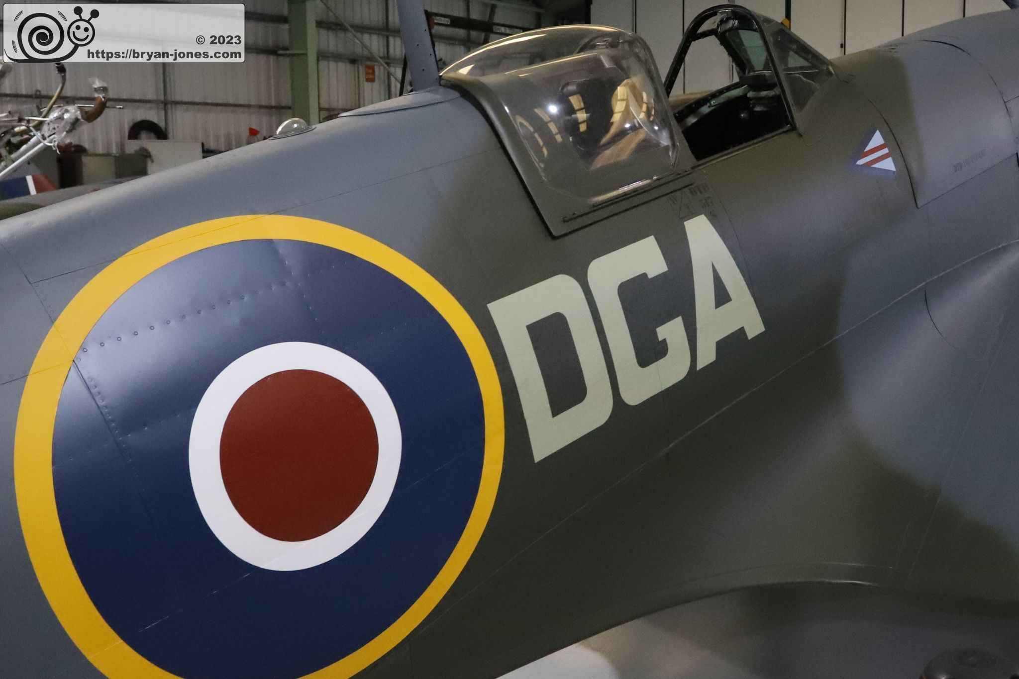 Spitfire Mk XVI TE184 cockpit and roundel in aircraft hangar