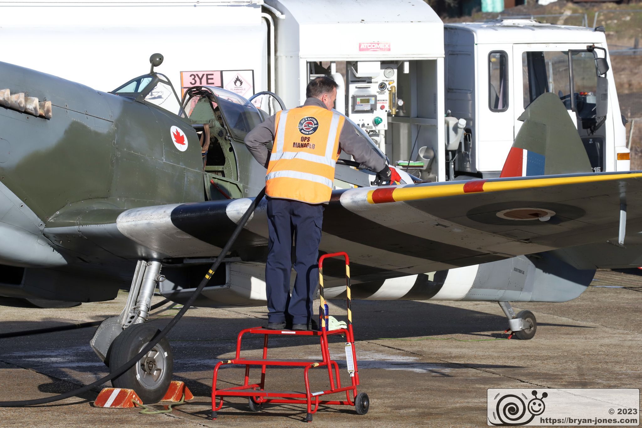 Two seat RCAF 1943 Spitfire T.9 MJ633 refuelling from tanker