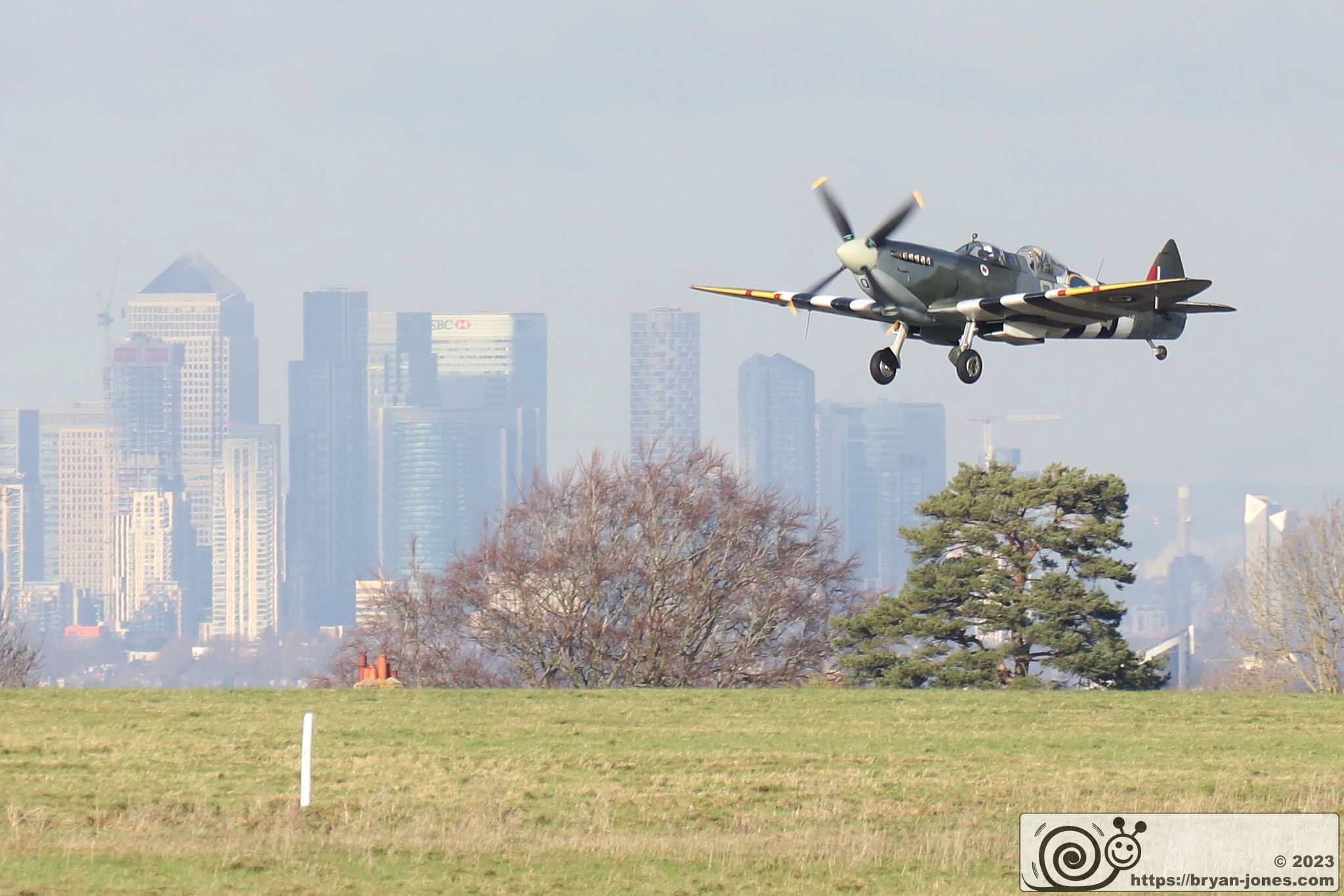 Two seat RCAF 1943 Spitfire T.9 MJ627 takeoff, Canary Wharf