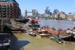 Houseboats and gardens at Tower Bridge moorings on the River Thames in London. Taken on 19-May-2018 during London Open Gardens Weekend. House boat.
