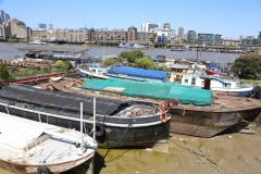 Houseboats and gardens at Tower Bridge moorings on the River Thames in London. Taken on 19-May-2018 during London Open Gardens Weekend. House boat.