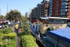 Houseboats and gardens at Tower Bridge moorings on the River Thames in London. Taken on 19-May-2018 during London Open Gardens Weekend. House boat.