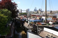 Houseboats and gardens at Tower Bridge moorings on the River Thames in London. Taken on 19-May-2018 during London Open Gardens Weekend. House boat.