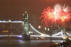 Tower Bridge with 2019 fireworks at Southwark Park as a dramatic backdrop