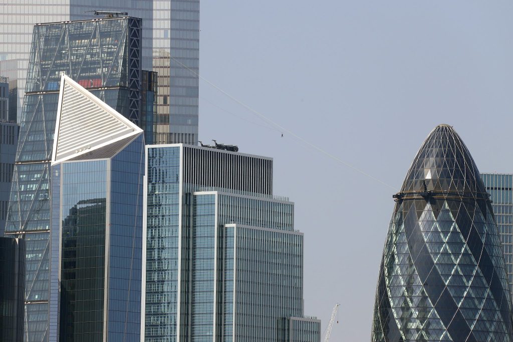 A participant slides down the zipwire between The Cheesegrater and The Gherkin in the City of London on 09-Sep-2023.